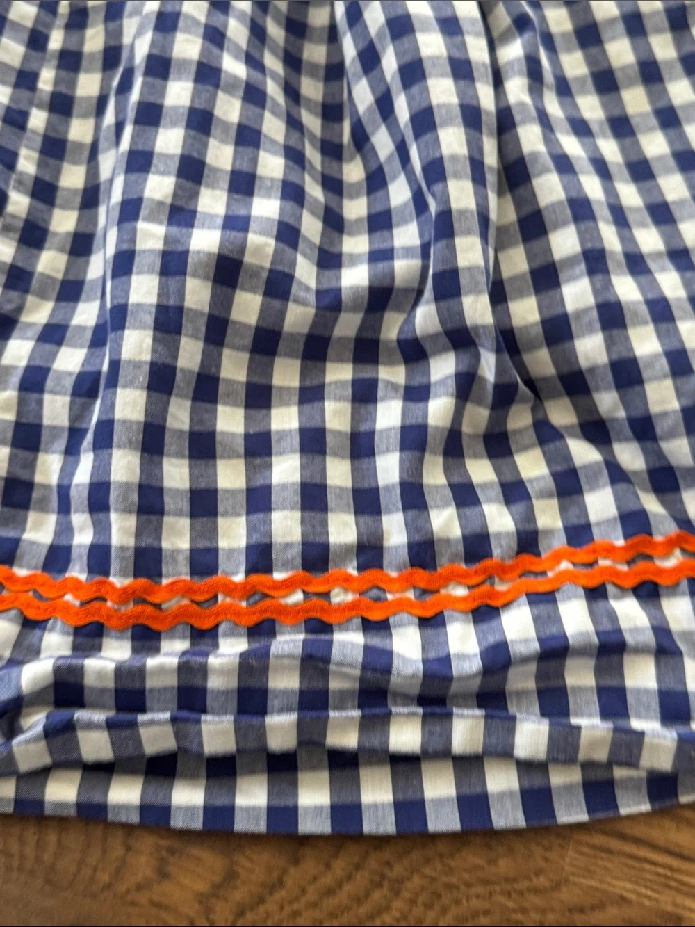Cecil And Lou Navy Gingham Smocked Dress with Smocked Orange Pumpkin Embroidery